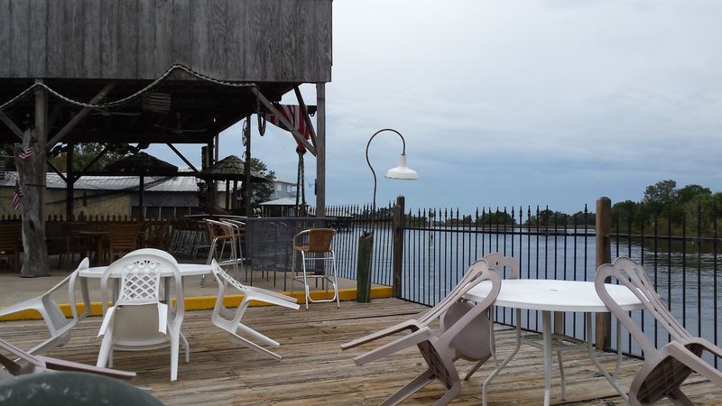 The Deck, the Tiki Bar, and Backyard Games The Deck, the Tiki Bar, and Backyard Games