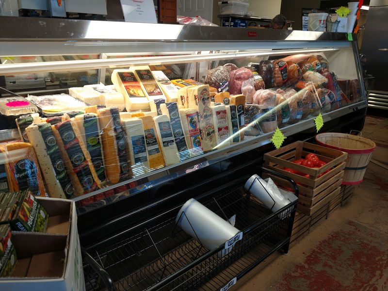 The Deli Counter Full of Meats and Cheeses The Deli Counter Full of Meats and Cheeses