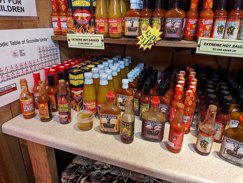 The Locked Cabinet of Scorching Hot Sauces The Locked Cabinet of Scorching Hot Sauces