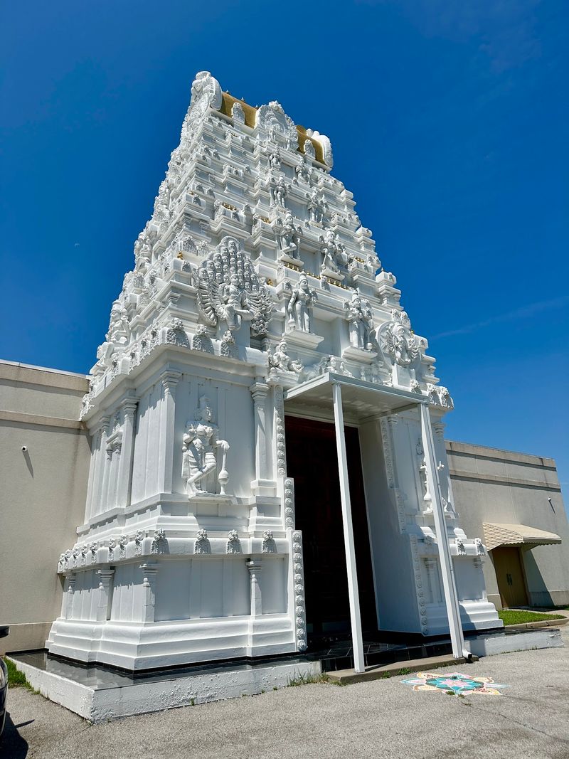 The Ornate Entrance and Its Carved Deity Sculptures The Ornate Entrance and Its Carved Deity Sculptures