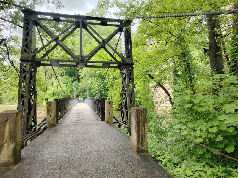 The Swinging Footbridge: A 1909 Landmark That Still Moves Beneath Your Feet The Swinging Footbridge: A 1909 Landmark That Still Moves Beneath Your Feet