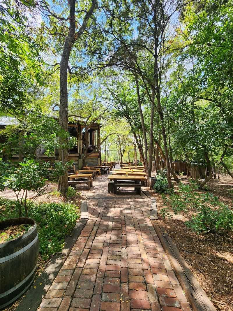 Tiered Patios Beneath Spanish Moss Tiered Patios Beneath Spanish Moss