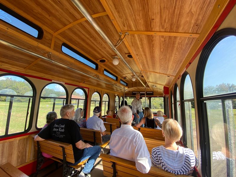 Trolley Rides Past Greenhouses and Grazing Goats