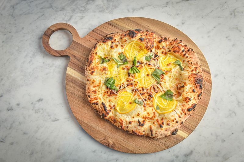 Wood-Fired Pizza With Neapolitan Roots Wood-Fired Pizza With Neapolitan Roots