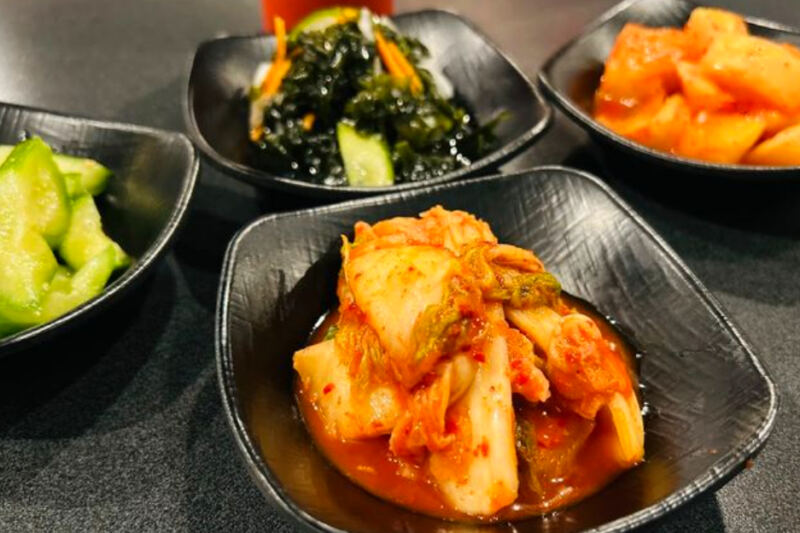 This Stylish Michigan Spot Is Known for Sizzling Bibimbap, Crispy Tangsu-Yuk, and Rich Black Bean Noodles