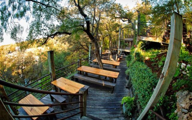 Gruene’s Grist Mill Restaurant Lets You Eat Brisket on a Deck Hanging Over the Guadalupe River