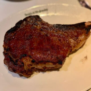 This High-End Boston Steakhouse Cooks Its Dry-Aged Prime Steaks to Perfection Right Beside the Harbor