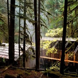 This Oregon Hot Spring Lets You Soak in 100-Degree Cedar Tubs While Snow Falls Around You
