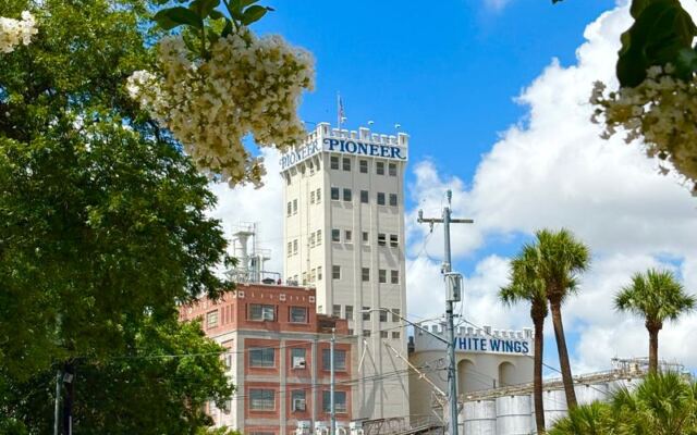At Pioneer Flour Mill in San Antonio, the Country Store Serves Fresh Biscuits Beside a Historic Riverside Mill