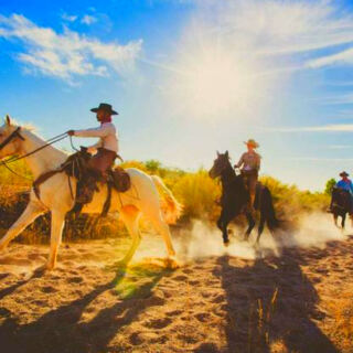 13 Places Where You Can Ride With Cowboys Across the Open Range