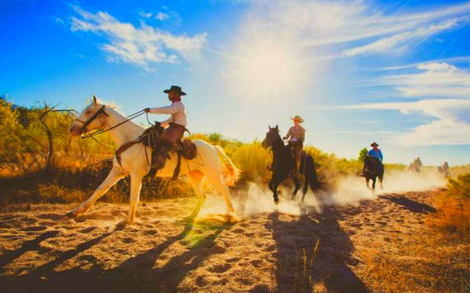 13 Places Where You Can Ride With Cowboys Across the Open Range