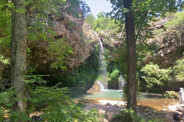 Wander This Oklahoma State Park to Reach a 77-Foot Waterfall Hidden in a Lush Canyon