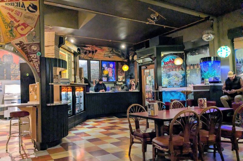 This Retro Olympia, Washington Pizza Joint Pairs Plate-Sized Thin-Crust Slices With Pinball and ’80s Posters