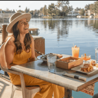 This Arizona Lakefront Hangout Serves Live Music and Sunsets From a Dock Right on the Water