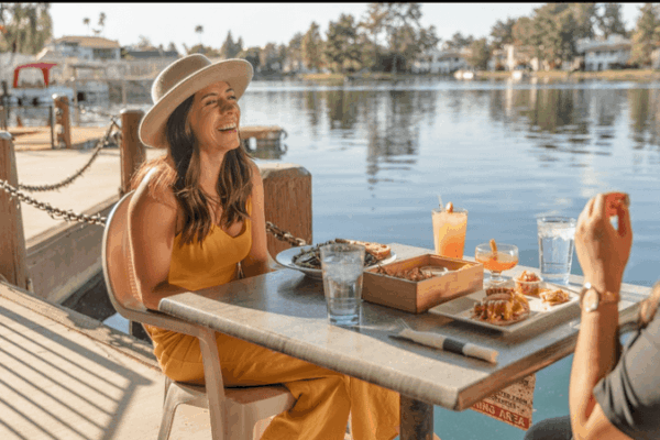 This Arizona Lakefront Hangout Serves Live Music and Sunsets From a Dock Right on the Water