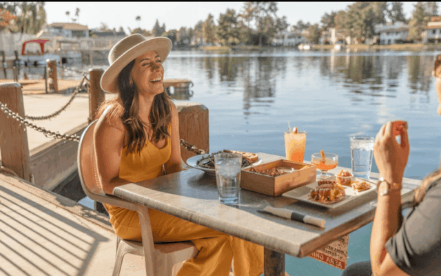 This Arizona Lakefront Hangout Serves Live Music and Sunsets From a Dock Right on the Water