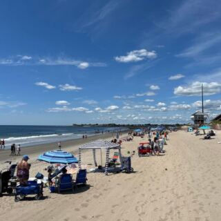 This Rhode Island State Beach Rolls Out a Mile of Sand for a Cheap Summer Getaway