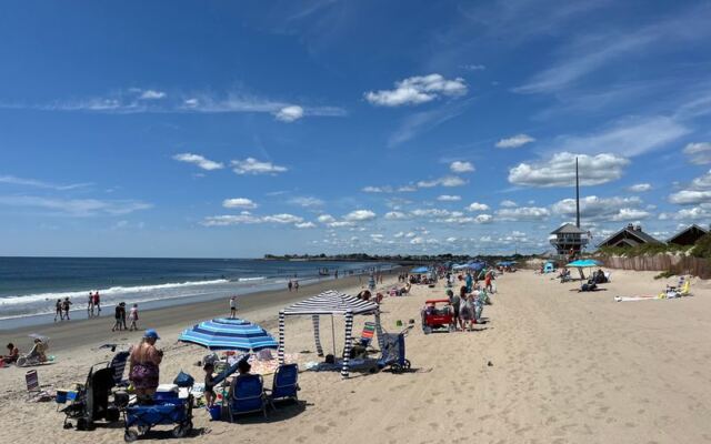 This Rhode Island State Beach Rolls Out a Mile of Sand for a Cheap Summer Getaway