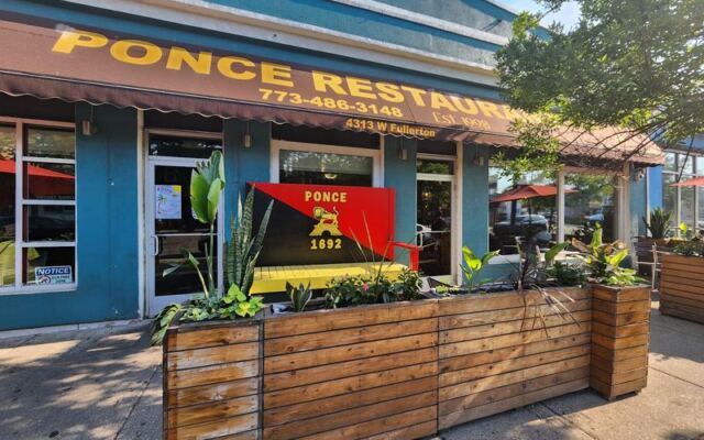 This Family-Run Illinois Joint Serves Jibaritos And Salsa Music Puerto Rican Locals Drive In For