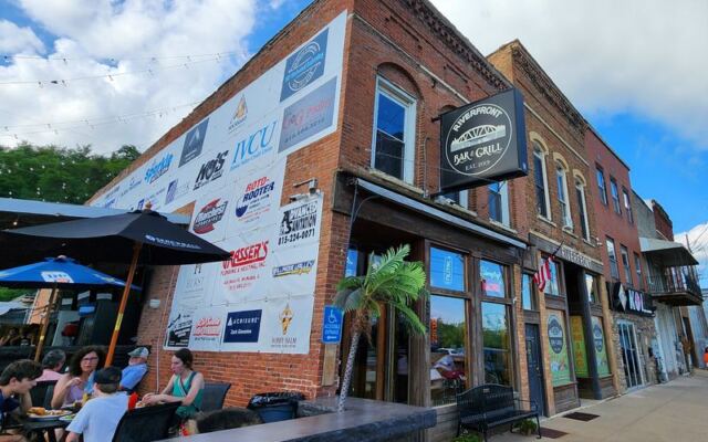 This Off-the-Beaten-Path Illinois Bar and Grill Serves Up Live Music, Cold Beers, and Views of the River Across the Street
