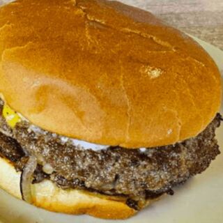 This Retro Indiana Diner Has Been Slinging Famous Onion Burgers Under A Ceiling Train For Decades