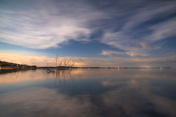 Lake Buchanan Is a Dammed Hill Country Reservoir Where Texans Kayak, Swim for Free, and Party on a Sandbar