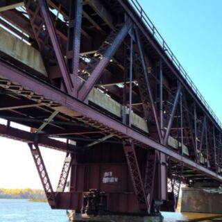 This Minnesota Bridge Lets You Drive With Freight Trains Rumbling Overhead