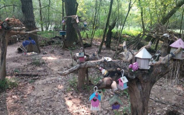 Along a Georgia Greenway Trail, a Tiny Fairy Village Hides in the Woods, Weathered but Still Enchanting