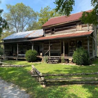 This Anderson County, Tennessee Cabin Village Was Rebuilt by Hand and Comes Alive With Blacksmiths and Reenactors