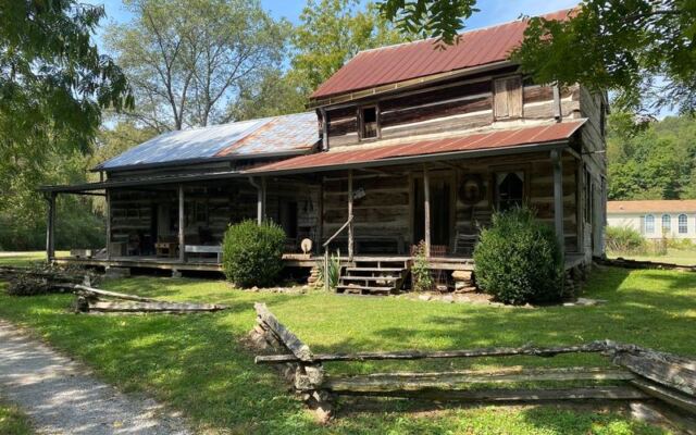 This Anderson County, Tennessee Cabin Village Was Rebuilt by Hand and Comes Alive With Blacksmiths and Reenactors