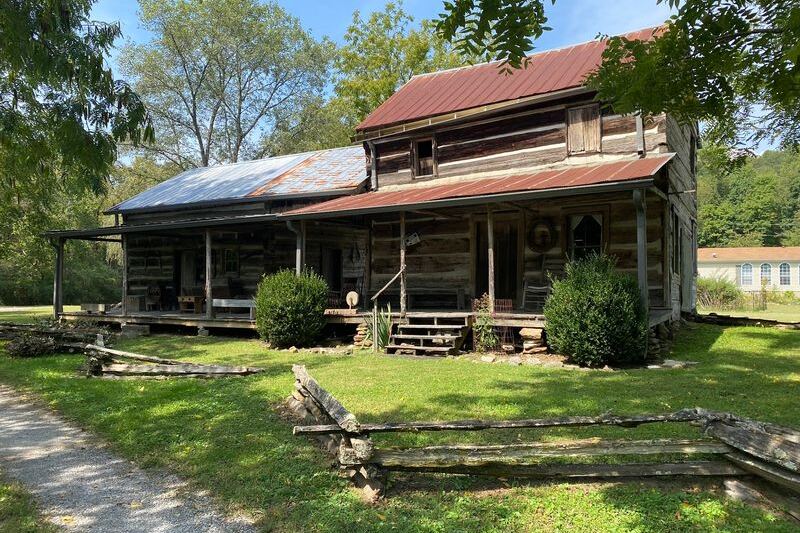 This Anderson County, Tennessee Cabin Village Was Rebuilt by Hand and Comes Alive With Blacksmiths and Reenactors