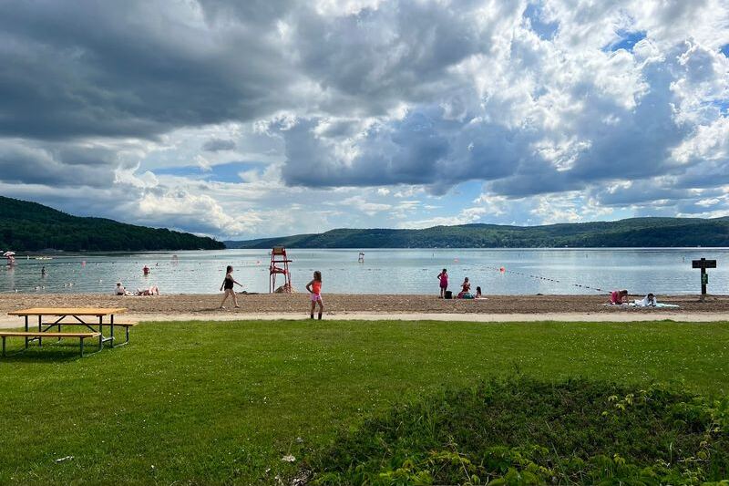 This Scenic New York State Park Beach Lets You Swim In Clear Otsego Lake For Just $7