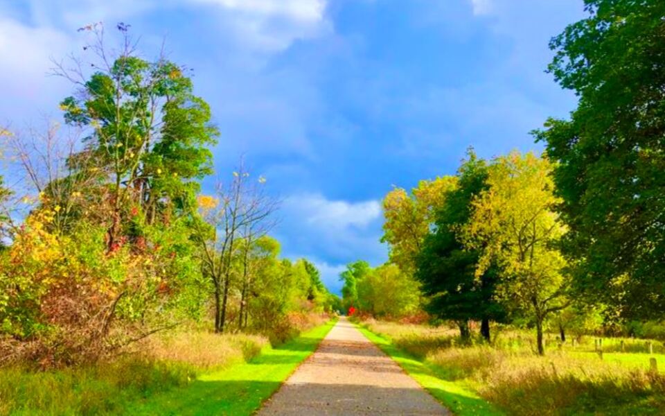 This 92-Mile Michigan Trail Winds Through Forests, Small Towns, and Scenic Countryside