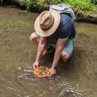 This New Jersey Fossil Bed Lets You Dig Through A Creek For Cretaceous Shark Teeth