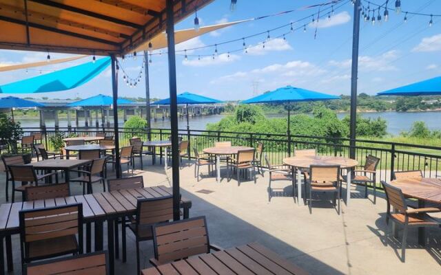 This Oklahoma Restaurant Serves Sushi and Lobster Ravioli on a Patio Right Over the Arkansas River