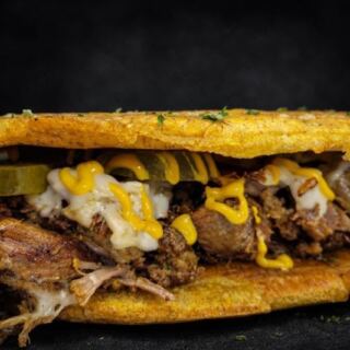 Ordering ‘Something Small’ Never Works at This Fayetteville Puerto Rican Spot Serving Pernil and Mofongo
