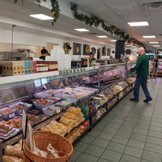 The German Butcher in Forked River serves sandwiches beside its house-made sausages