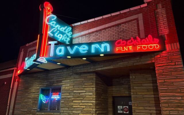 Denver Locals Swear This Neon-Lit Pearl Street Dive Serves the City’s Best Burgers