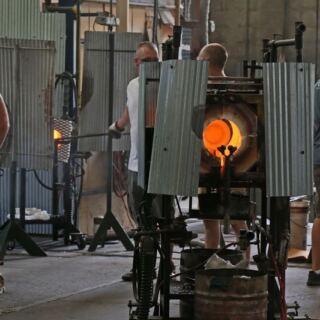 Inside A Cambridge Ohio Factory You Can Watch Glassblowers Shape Molten Glass By Hand