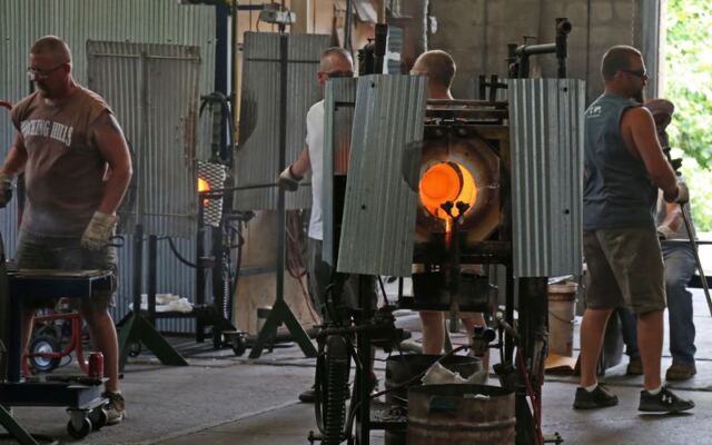 Inside A Cambridge Ohio Factory You Can Watch Glassblowers Shape Molten Glass By Hand