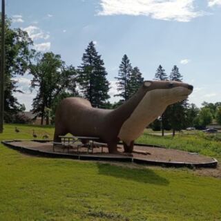 This Minnesota Town Has A 40-Foot Otter Watching Over The Lake