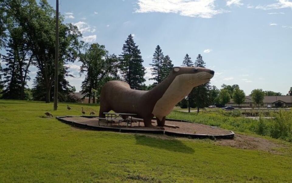 This Minnesota Town Has A 40-Foot Otter Watching Over The Lake