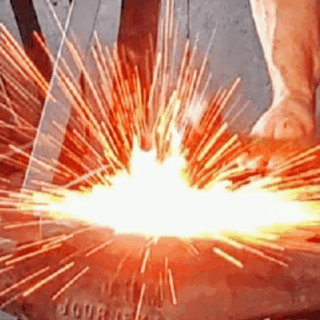 At This Pigeon Forge Blacksmith Shop You Hammer a Railroad Spike Into a Knife to Take Home