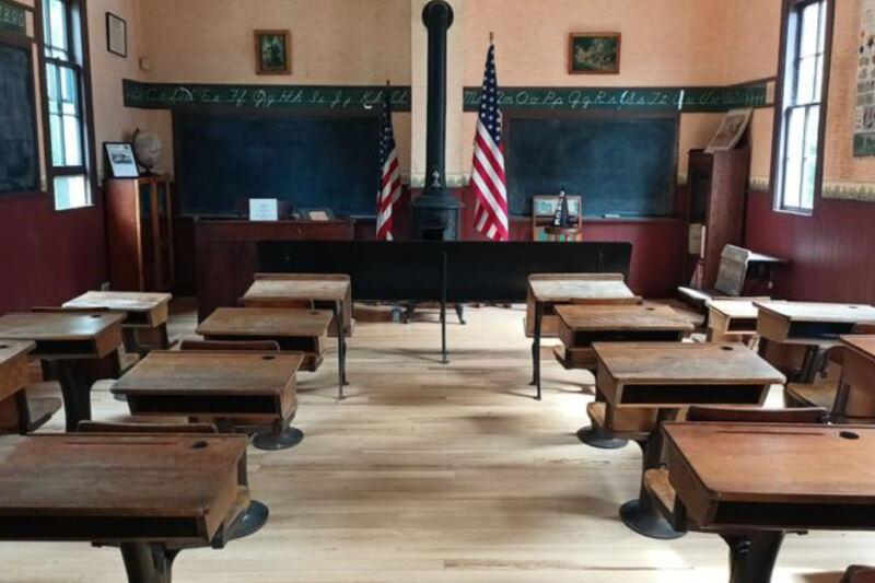 This Hidden Michigan Museum Has a Train Caboose, One-Room Schoolhouse, and a Whole Village Frozen in Time