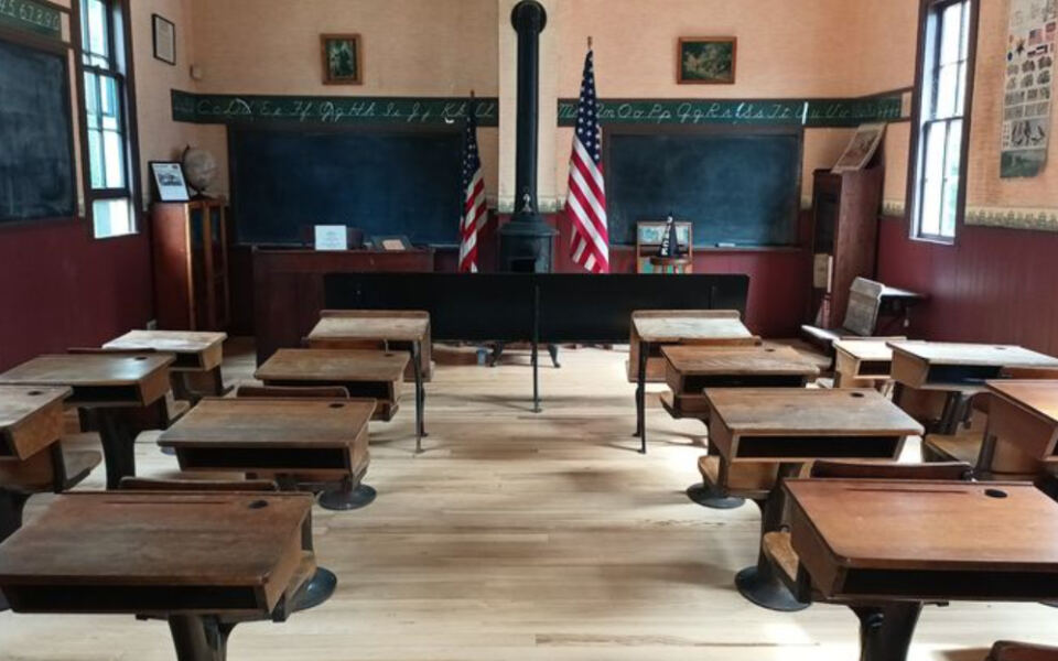 This Hidden Michigan Museum Has a Train Caboose, One-Room Schoolhouse, and a Whole Village Frozen in Time