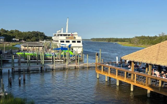 Fresh Flounder and Crab Meet a Riverside Tiki Bar at This South Carolina Marina Grill