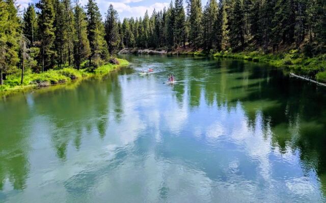 This Oregon Lake Hideout Lets You Swim, Paddle, and Camp Like It’s Your Own Water Park