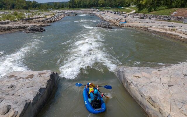 This Hidden Oklahoma Channel Lets You Tube Down Eight Drop-Rapids Deep in the Woods