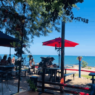 This Laid-Back Illinois Cafe Sits Right on Lake Michigan With Weekend Live Music and Lakefront Seafood