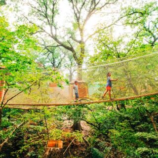 This Nebraska Tree Adventure Has 11 Treehouses and a 50-Foot Slide